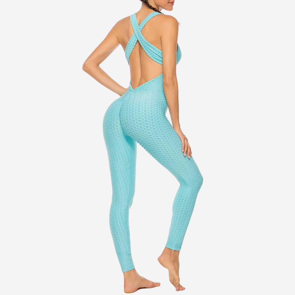 Light blue jumpsuit with open back on a white background
