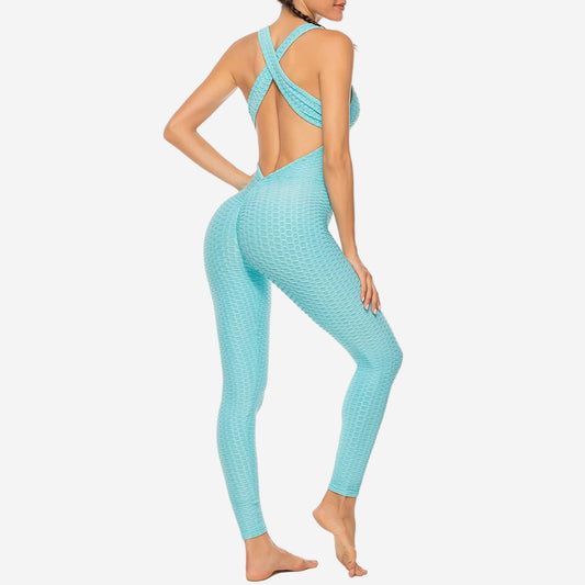 Light blue jumpsuit with open back on a white background