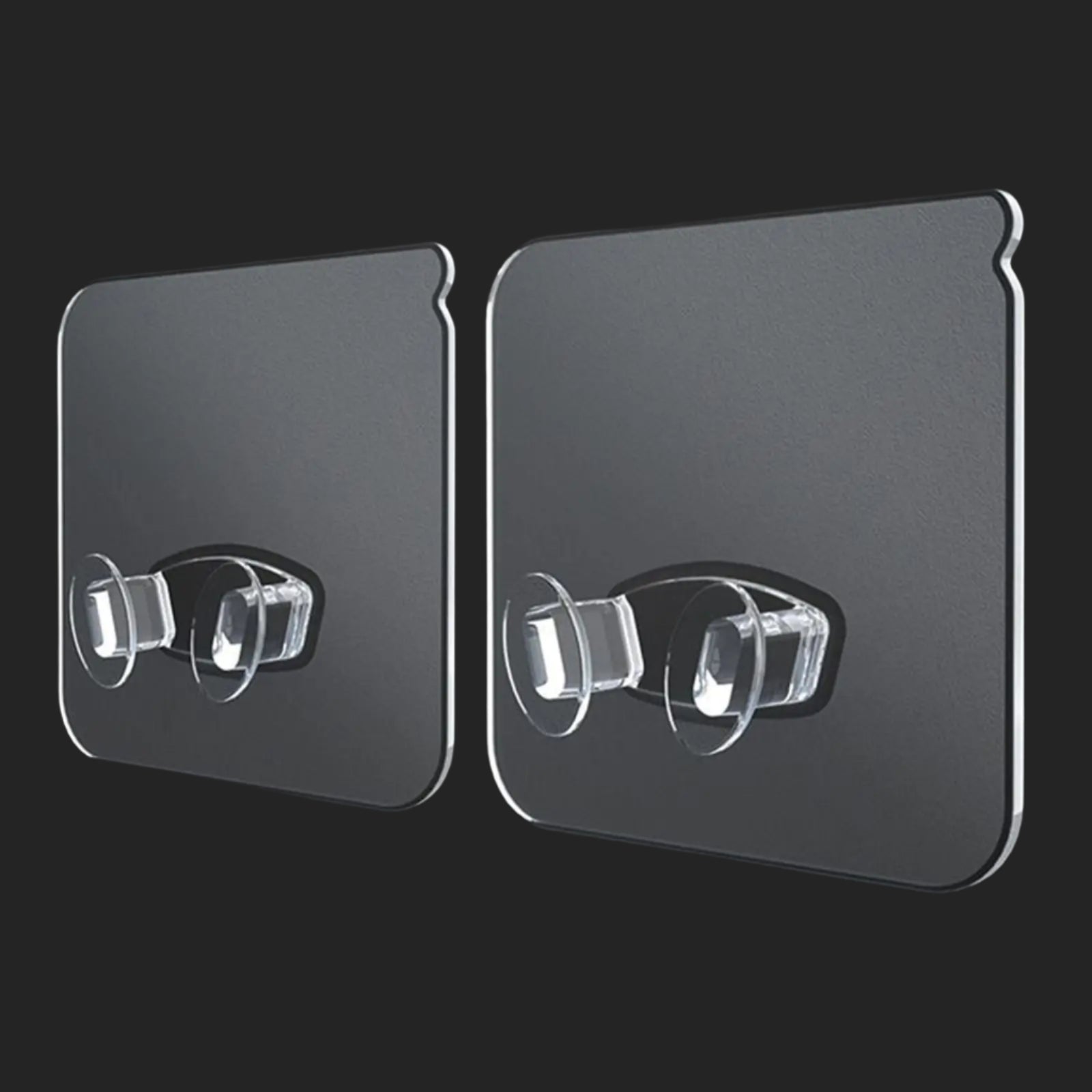 Two black adhesive strips with clear silicone hooks on a black background, labeled '10pcs'.
