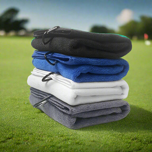 Stack of black, blue, and gray socks on a white background