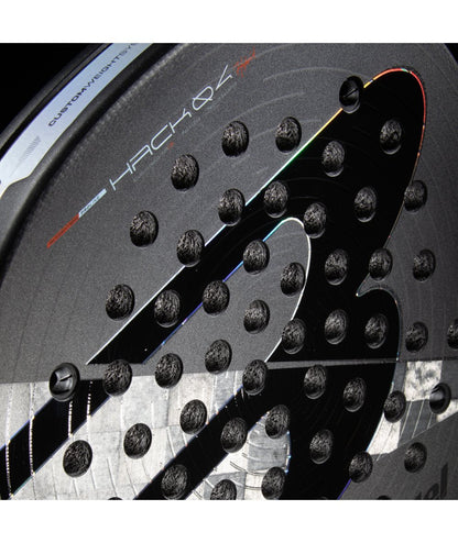 Close-up of Bullpadel Hack 04 Hybrid 18K aluminised carbon face